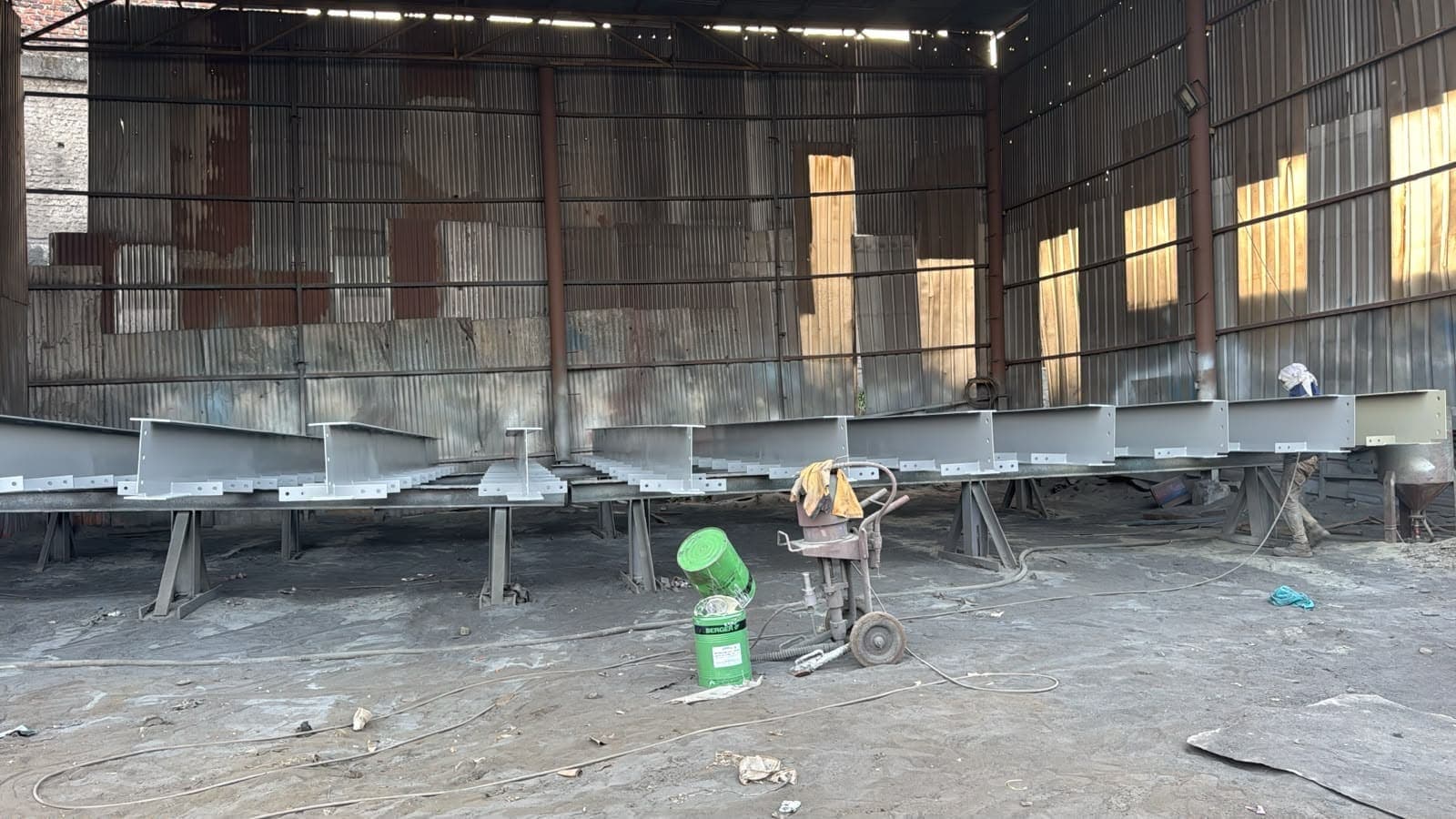 Blasting and painting yard with members on trestles