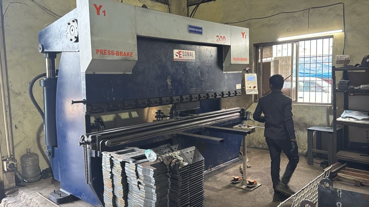 Press brake bending a steel plate