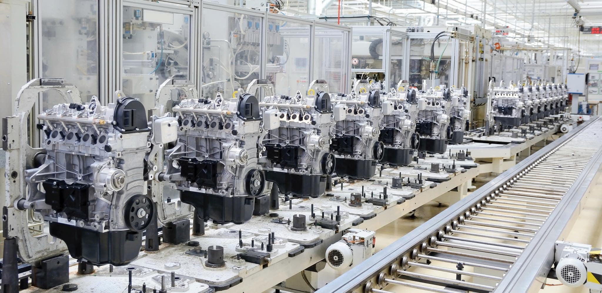 Engines moving along an automotive assembly line