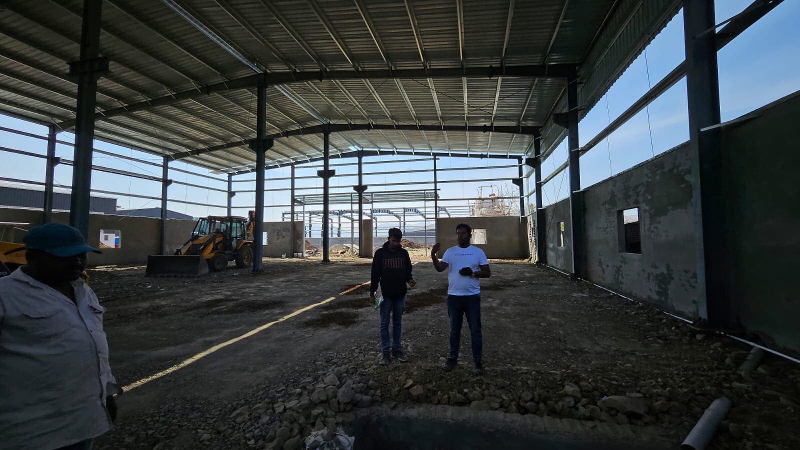 Clear-span portal frames inside the manufacturing unit during construction