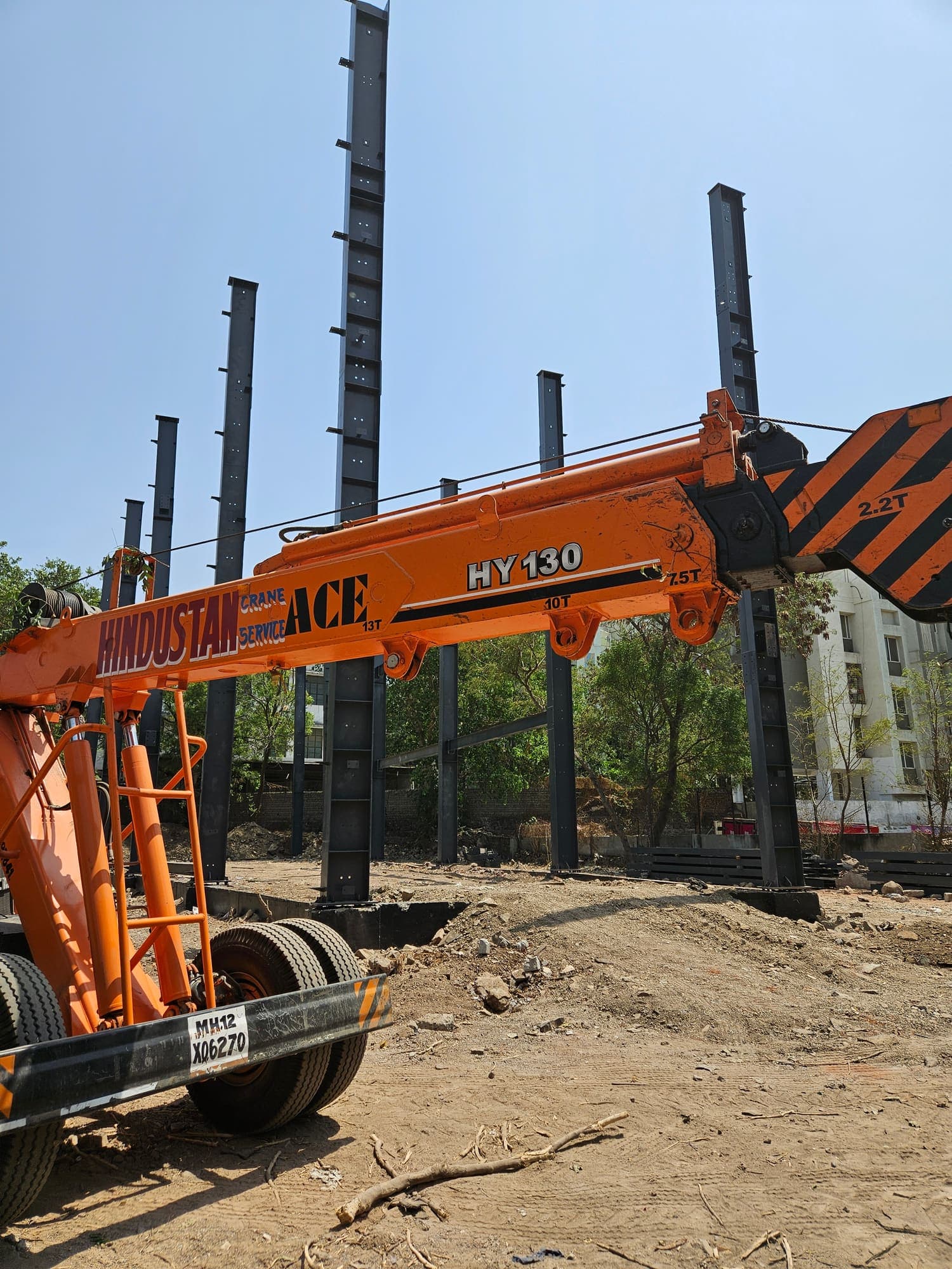 Hydra crane erecting the first steel columns on site
