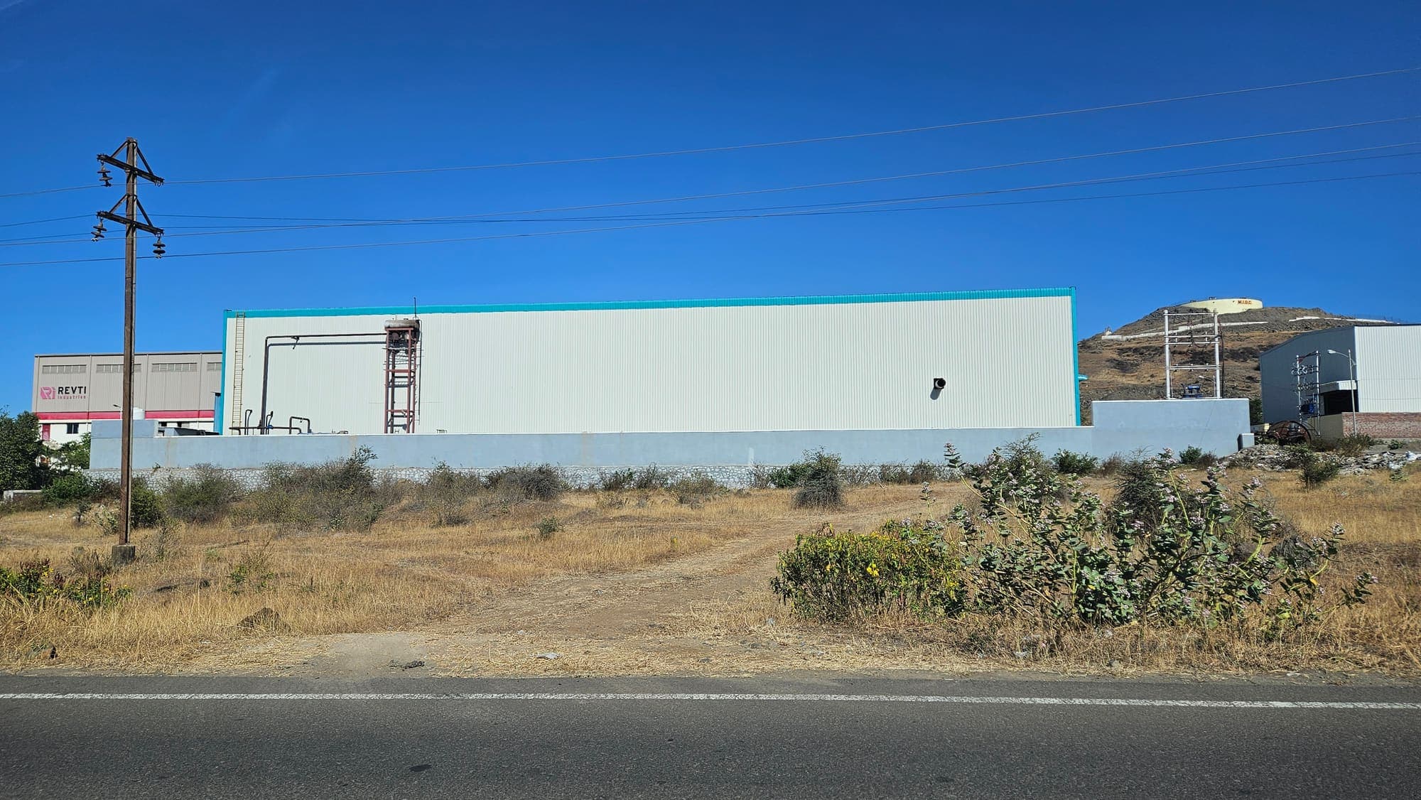 Clad exterior of the Shalirex manufacturing unit from the road